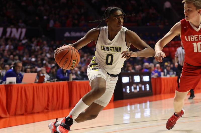 Yorkville Christian’s K.J. Vasser drives to the basket against Liberty in the Class 1A championship game at State Farm Center in Champaign. Friday, Mar. 11, 2022, in Champaign.