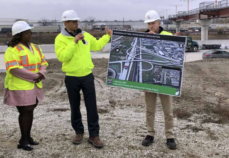 Illinois tollway Chief Engineer Manar Nashif, center, and other officials provided an update Monday on construction of I-490, which will stretch from Franklin Park to Des Plaines.