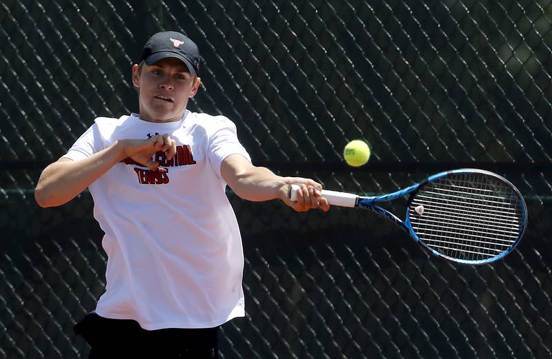 Hinsdale Central’s Alex Kotarski returns the ball during an IHSA 2A boys singles tennis match Thursday, May 25, 2023, at Barrington High School.