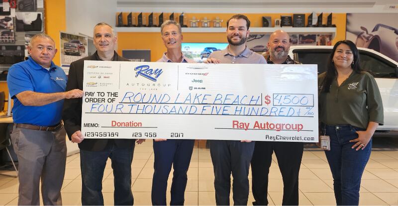This year’s Elote Festival is proudly sponsored by Ray Auto Group and Raymond Auto Group, who recently presented a generous $4,500 check to the nayor of Round Lake Beach, Scott Nickles, and his administrative team. This sponsorship is a testament to the strong community support and the importance of the event for local residents.