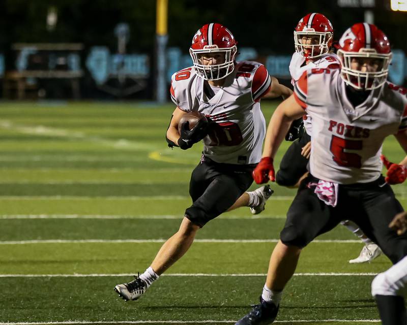 Yorkville's Luke Zook (10) runs with the ball during Class 7A football playoff game between Yorkville at Willowbrook.   Oct 27, 2023.