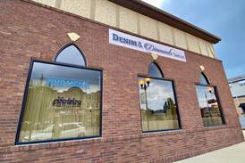 Building housing Denim & Diamonds Saloon up for sale, bar to stay open