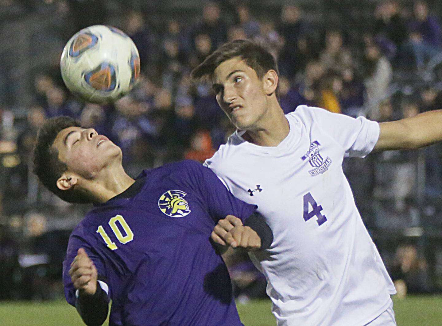 Mendota's Yahir Diaz, (no,10) beats Peoria Christian's Bryce Pollizze (no,4) to a header in the Class 1A Sectional semifinal game in Chillicothe on Tuesday Oct. 19, 2021.