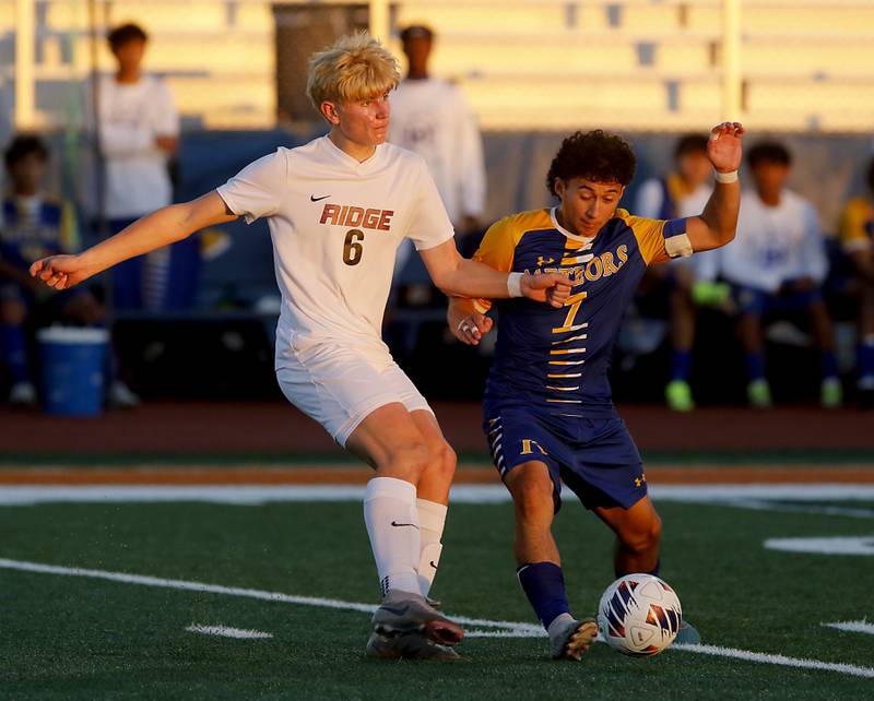 Prairie Ridge's Matthew Fireng battles with Chicago De La Salle's Agustin Ortega for control of the ball during an IHSA Class 2A state semifinal soccer match on Friday, Nov. 8, 2024, at Hoffman Estates High School.