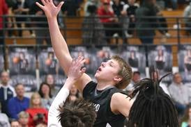 Boys basketball: Troyer Carlson, Kaneland hold off Belvidere North, reach sectional final