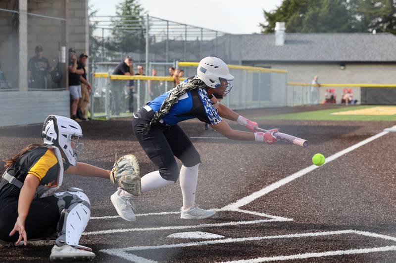 Central's Rayven Perkins connects for a bunt during the Comets' 13-6 loss to Herscher on Wednesday, May 14, 2025.