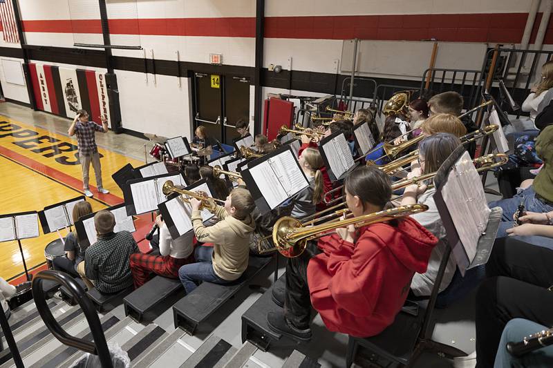 Avery Kerley leads his Amboy Junior High School Pep Band Tuesday, Feb. 3, 2026, during their half time performance.