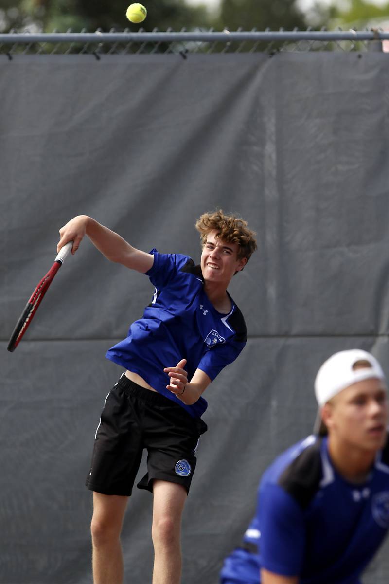 Geneva’s  Aaron Masoncup serves the ball as he and his doubles partner, Tyler Masoncup, compete in the Class 2A Boys State Tennis Tournament on Thursday, May 29, 2025, at Palatine High School.