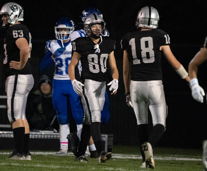 Kaneland’s Dylan Sanagustin (80) walks back to the sideline after scoring a touchdown against Riverside Brookfield during a 6A playoff football game at Kaneland High School in Maple Park on Friday, Oct 28, 2022.
