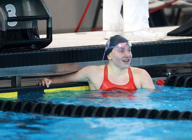 Oswego’s Katie Gresik looks at her time following the 500-yard freestyle championship heat during the IHSA Girls State Swimming and Diving Championships at the FMC Natatorium in Westmont on Saturday, Nov. 11, 2023.