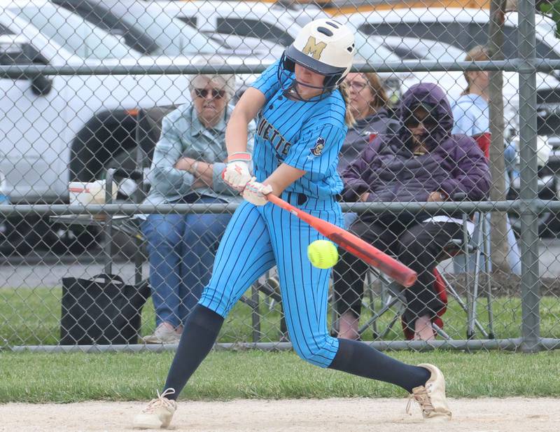 Marquette's Chloe Thrush smacks a hit against Marquette during the Class 1A Regional title game on Friday, May 22, 2026 at Serena High School.