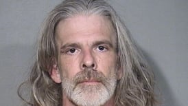 Crystal Lake school board candidate Walter Moist charged with violating order of protection
