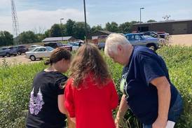 Master Gardeners visit Hall High School’s Conservation Garden