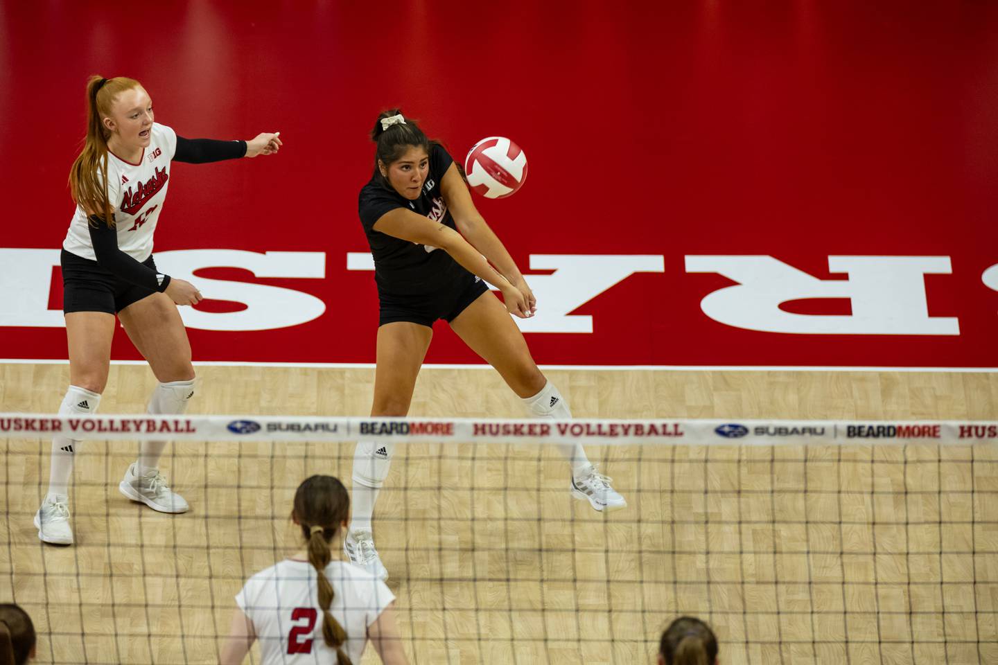 Nebraska libero Lexi Rodriguez digs a spike against Creighton on Sept. 10, 2024 in Lincoln, Neb. Rodriguez, a Sterling native, has been a star performer on two national championship runner-up teams in her previous three years with the Cornhuskers. (Photo courtesy of Nebraska Athletics)