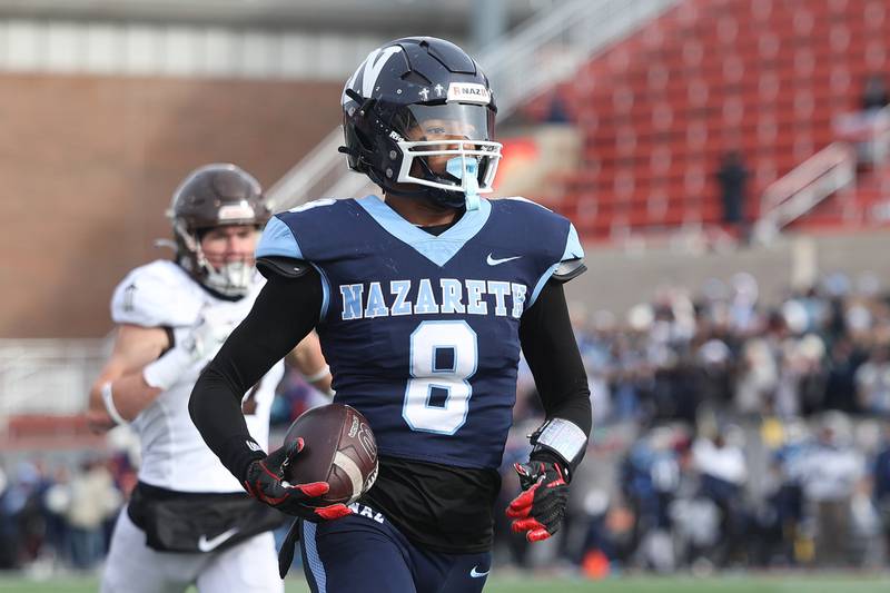 Nazareth’s Trenton Walker trots in for the 74 yard catch and run touchdown against Joliet Catholic in the Class 5A state championship on Saturday, Nov. 30, 2024 in Normal.