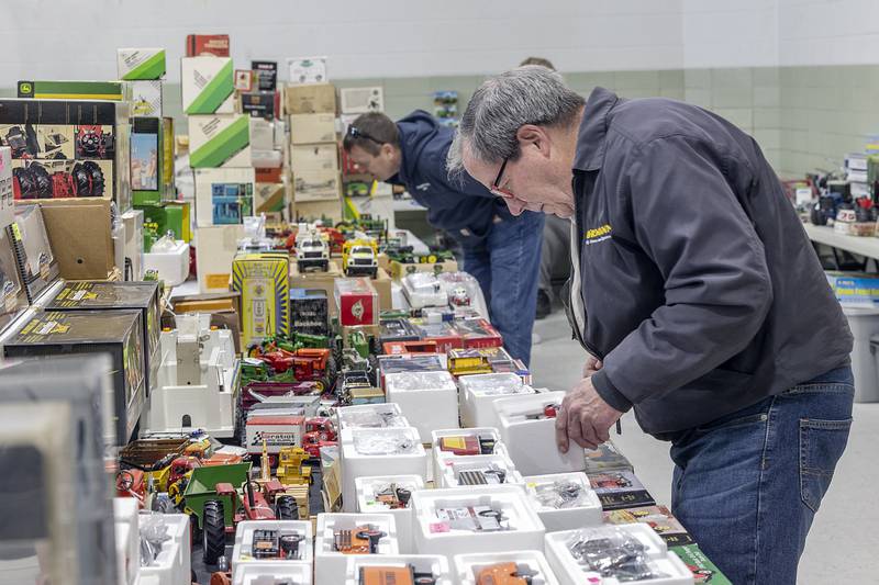 Dave Mellendorf checks out a display of toy trucks at the Ellice Dinges Center Saturday, March 15, 2025, in Sublette for the 43rd annual Farm Toy Show.