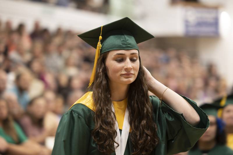 Valedictorian Brooke Howard steps up to receive her award Sunday, May 28, 2023 at Rock Falls High School’s 144th commencement ceremony.