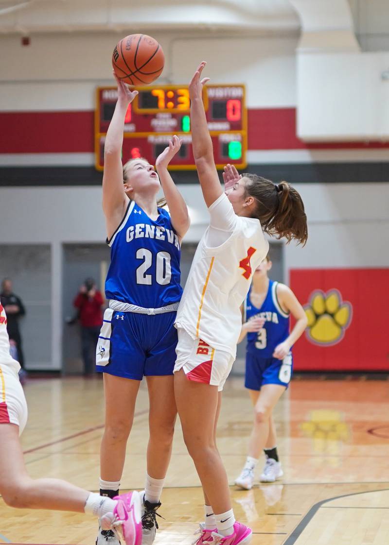 Geneva’s Caroline Madden (20) shoots the ball in the post against Batavia's Addi Lowe (4) during a basketball game at Batavia High School on Friday, Jan 26, 2024.