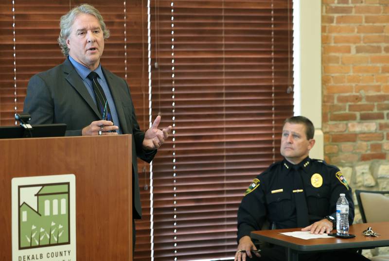 Bradley Waller, 23rd Judicial Circuit Court Chief Judge, speaks as Sycamore Police Chief Jim Winters looks on, Wednesday, Sept. 13, 2023 during the Community Protection and Well-Being Forum: A Conversation about the Safe-T Act, in the DeKalb County Community Foundation Freight Room in Sycamore. The event was hosted by the Sycamore Chamber of Commerce.