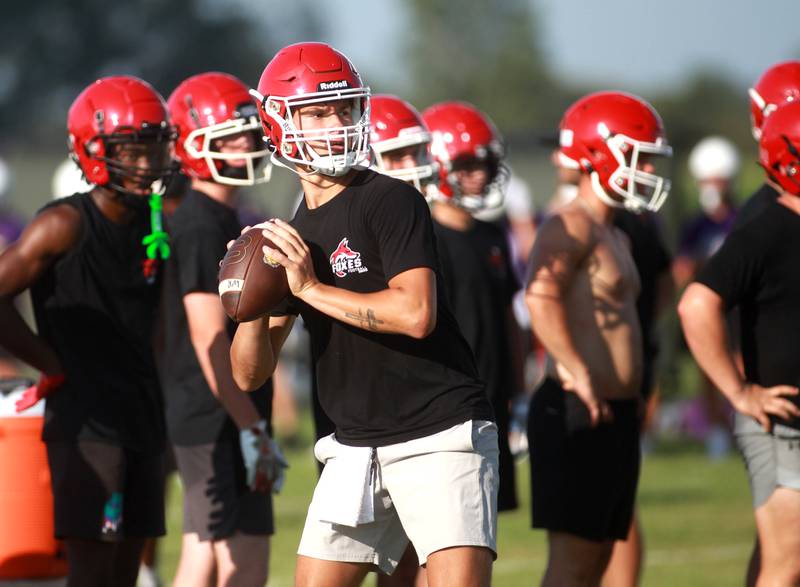 Yorkville quarterback Jack Beetham looks to throw the ball during a 7 on 7 football tournament on Tuesday, July 15, 2025 at Kaneland High School in Maple Park.