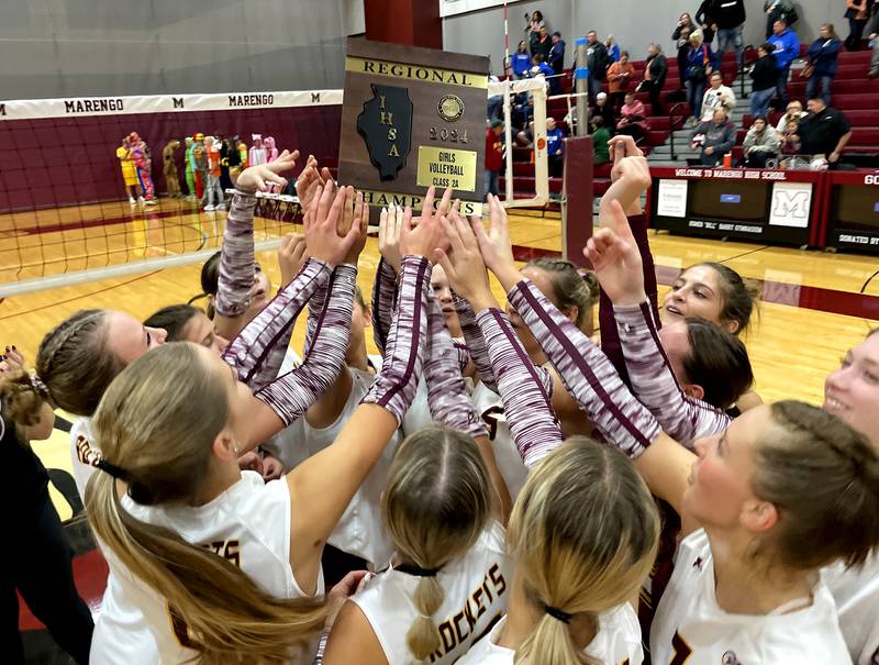 Richmond-Burton’s Rockets celebrate a two-set win over Genoa-Kingston in IHSA Class 2A Regional Title Game volleyball action on Thursday, Oct. 31, 2024, at  Marengo High School  in Marengo.