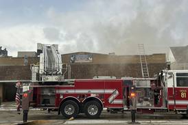 Fire that gutted 2 downtown McHenry shops started from roofing torch, caused 2 injuries: official report