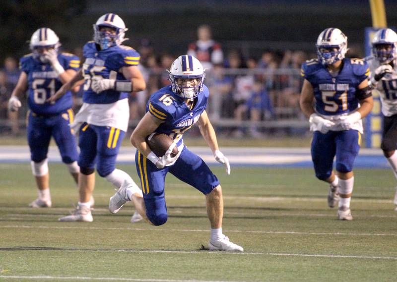 Wheaton North’s Matt Kuczaj runs the ball during a game against St. Charles North in Wheaton on Friday, Sept. 8, 2023.
