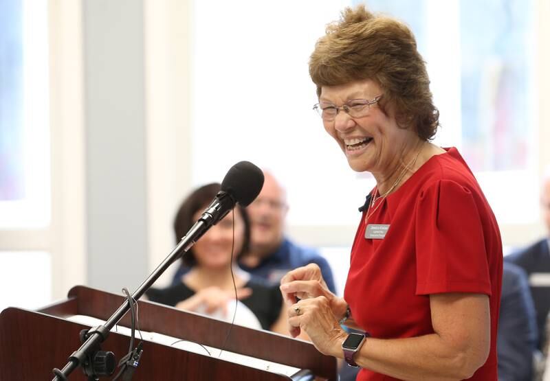 Jessica Kreiser executive director of Lighted Way smiles while  giving a speech during the ribbon cutting and dedication on Saturday, Aug. 5, 2023 in La Salle.