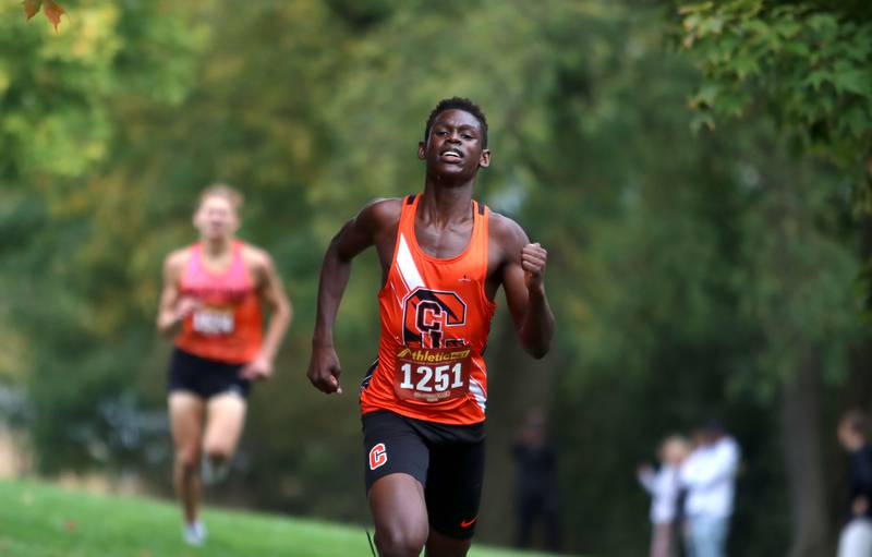 Crystal Lake Central’s Amana Omale wins the Fox Valley Conference Cross Country Meet at McHenry County College in Crystal Lake on Saturday, October. 18, 2025.
