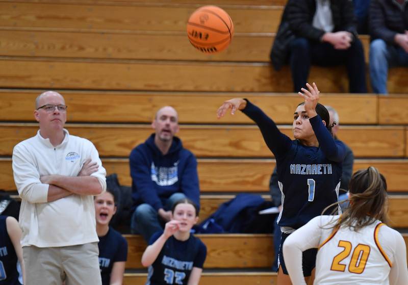 Nazareth’s Allia Von Schlegell shoots one of her six three pointers as her coach Eddie Stritzel watches during a Coach Kipp Hoopsfest game against Montini on January 20, 2025 at Benet Academy in Lisle.