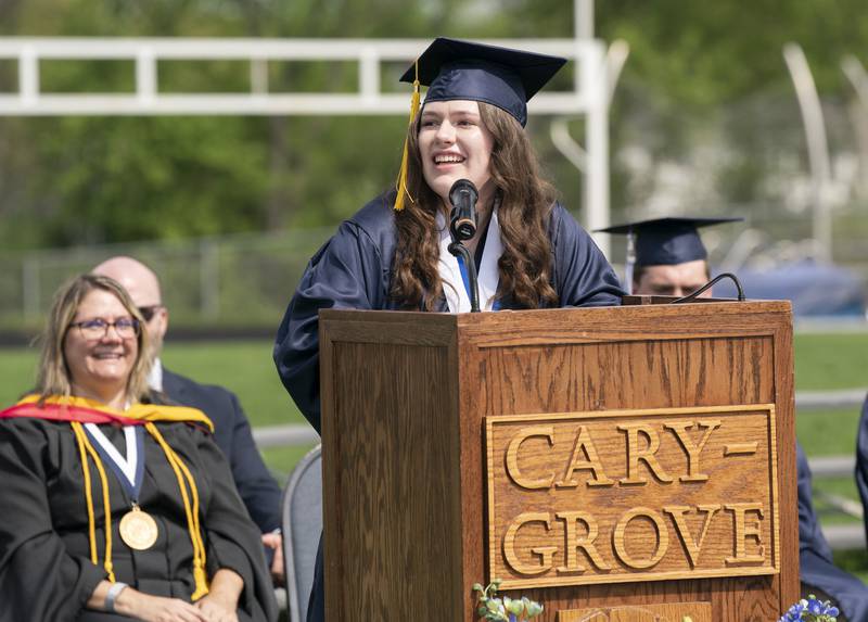 Student speaker Kaitlyn Kinsch addresses classmates during a graduation ceremony for the class of 2022 on Saturday, May 14, 2022, at Cary-Grove High School in Cary.