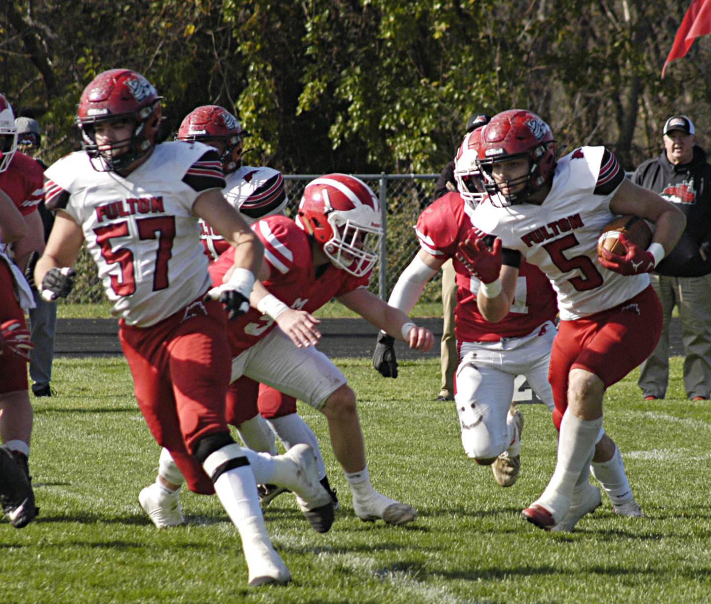 Fulton's A.J Boardman picks up yards against Morrison, Saturday, Oct. 28, 2023 in round one of the Class 1A football playoffs.