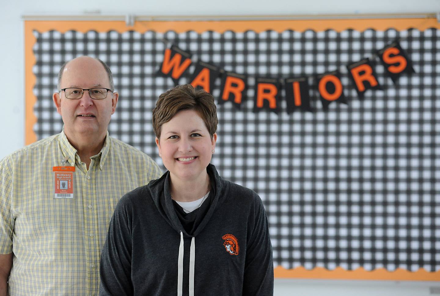 Teachers Erin Harris, right, and her father, teacher Bruce Montressor, at McHenry High School’s Freshman Campus. Harris is the daughter of two teachers and has never been without a parent at school. 
Her mother, Maureen Montressor, is a teacher at Montini Catholic School in McHenry.