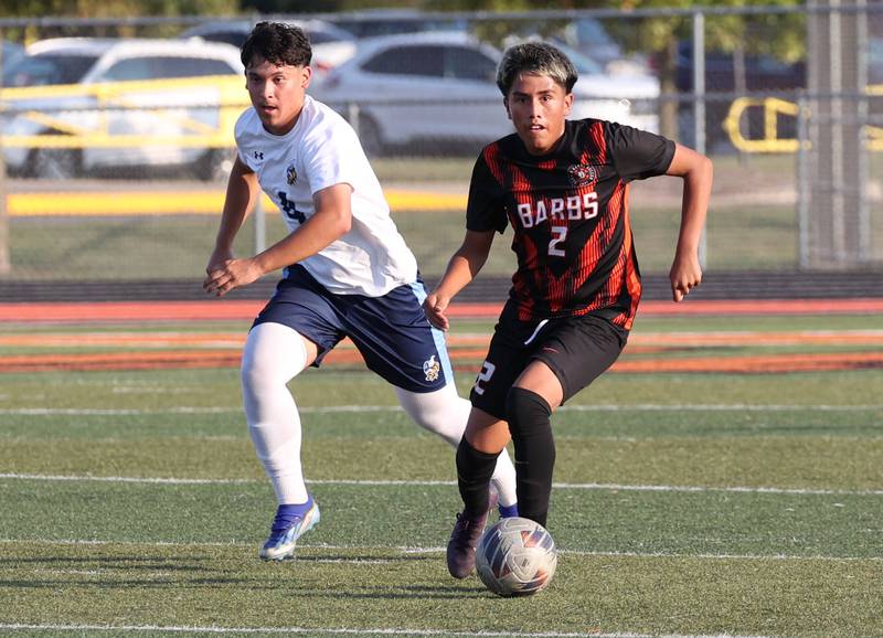 DeKalb's Jonathan contreras pushes the ball ahead of Guilford's Ivan Cuevas during their game Thursday, Sept. 18, 2025, at Dekalb High School.
