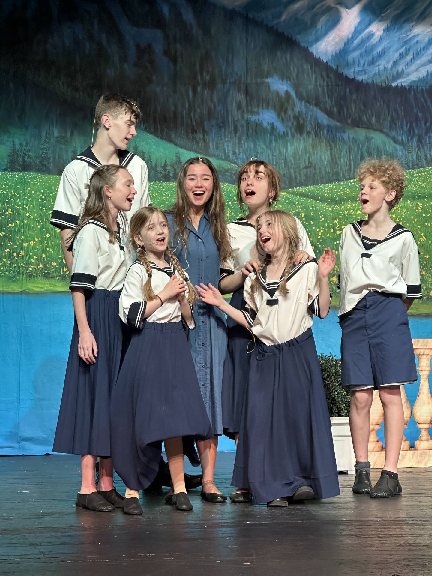 Maria sings with the children during "The Sound of Music."