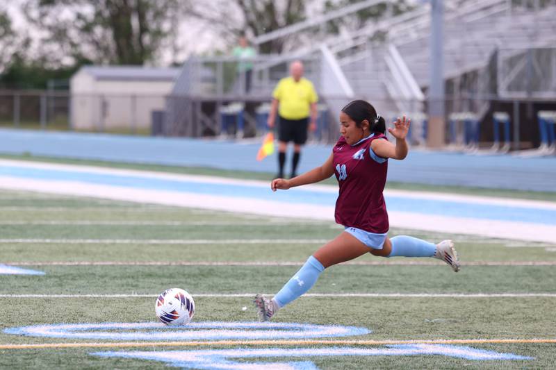 Kankakee's Rachel Sanchez-Aguilar shoots a direct kick for a goal during the Kays' 5-0 win against Blue Island Eisenhower in the Class 2A Kankakee Regional semifinals on Tuesday, May 19, 2026.