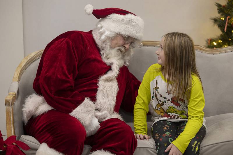 Olivia Reiners, 7, of Dixon chats with Santa about being on the nice list Monday, Dec. 16, 2024, during Cookies with Santa in Dixon. Last year the park district held a breakfast event but decided to keep things a little simpler with cookies and indoor play.
