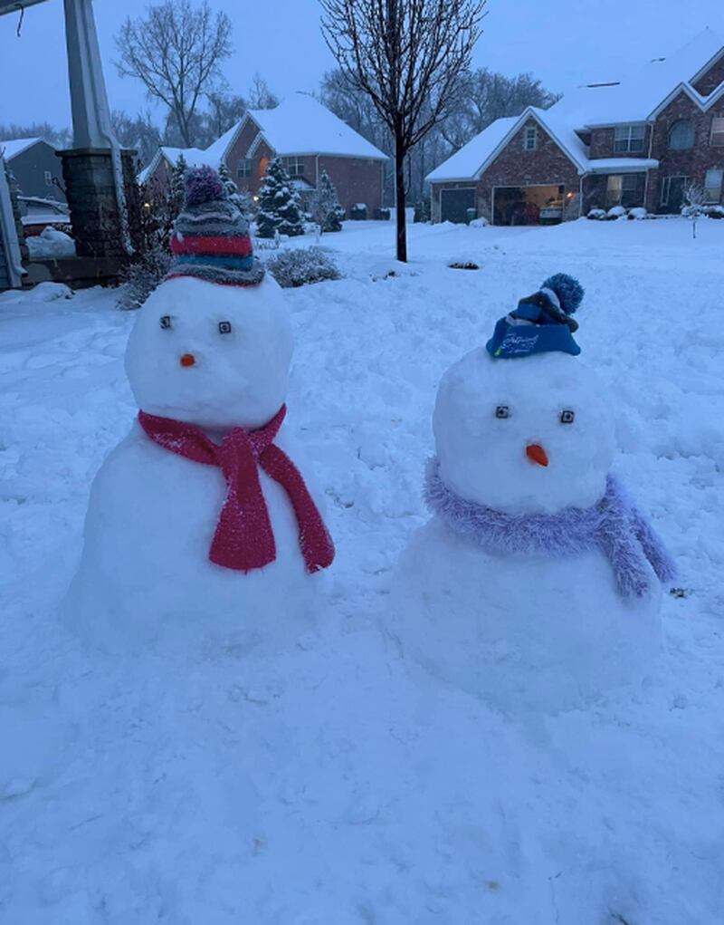 Algonquin Sgt. Rob Salazar's snowmen enter the social media competition the Algonquin Police Department started Friday evening.