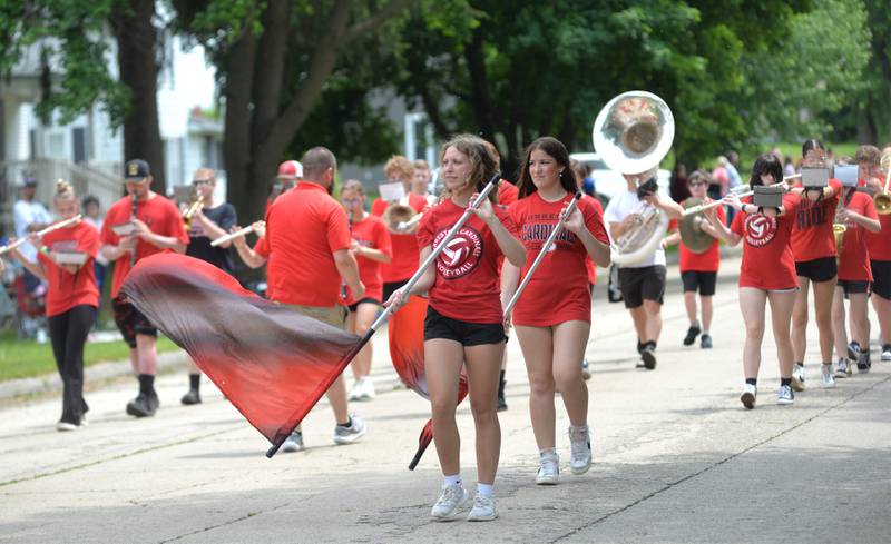 The flags led the Forreston High School marching band in the Leaf River Daze Parade in Leaf River on Sunday, June 8, 2025.