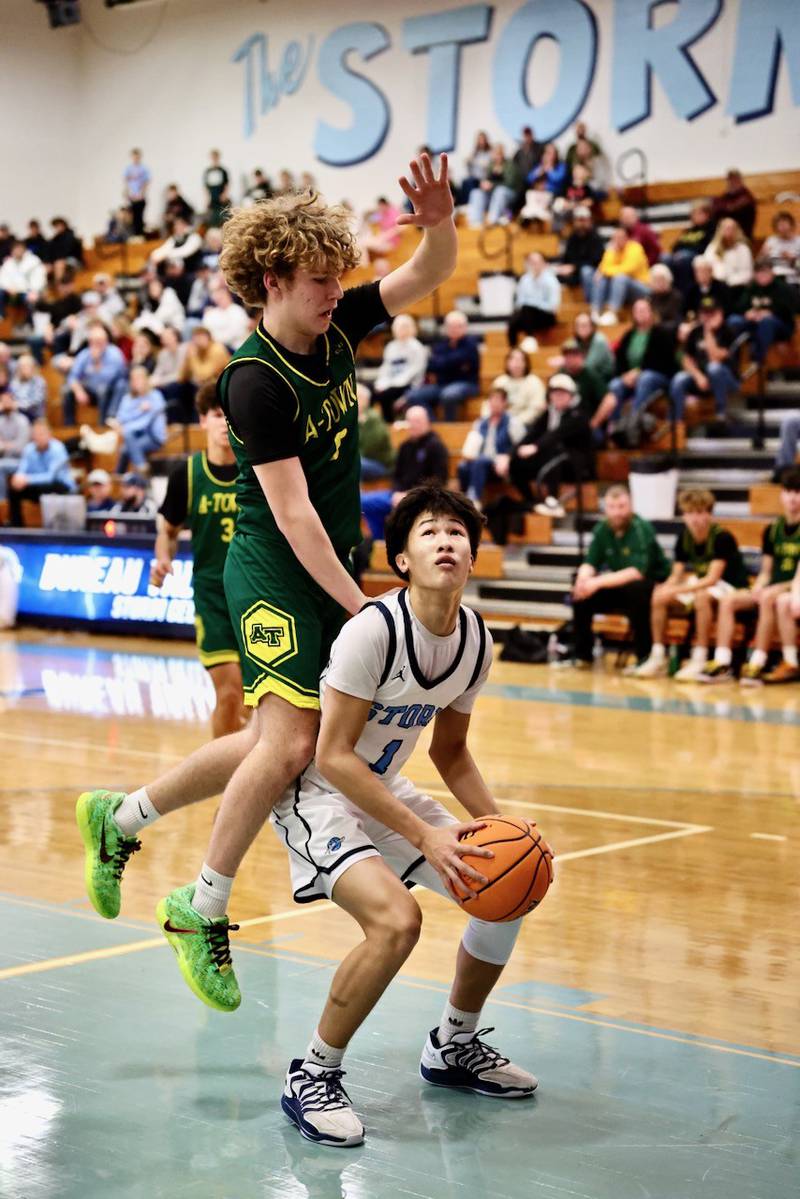 Bureau Valley's Carter Chhim gets his man up in Friday's against Abingdon-Avon at the Storm Cellar. A-Town won 47-45.