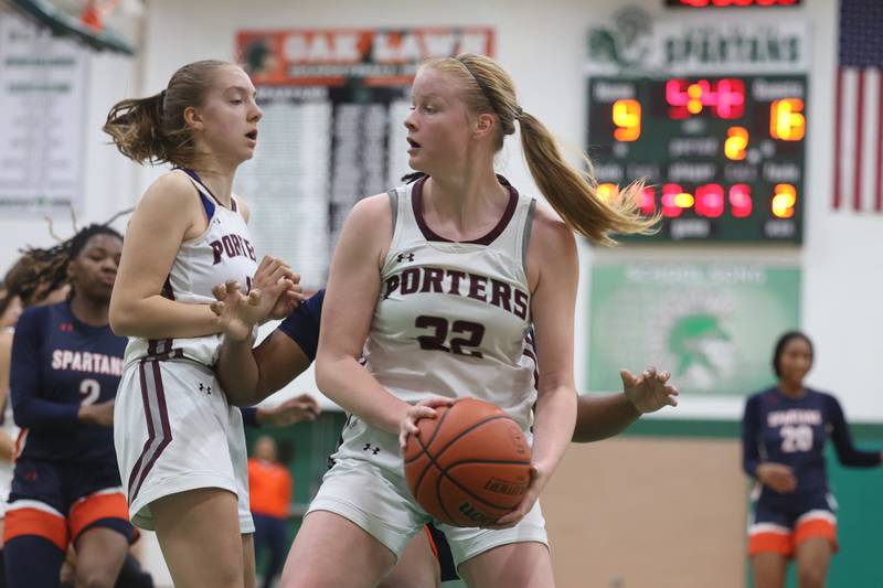 Lockport’s Makenna Klacko looks to pass after securing the ball against Romeoville in the Oak Lawn Holiday Tournament championship on Saturday, Dec.16th in Oak Lawn.