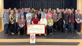 100 Women Who Care donate $8,600 to senior center