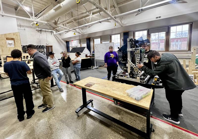 The Sterling High School robotics team works on the team's robot Wednesday, March 5, 2025.