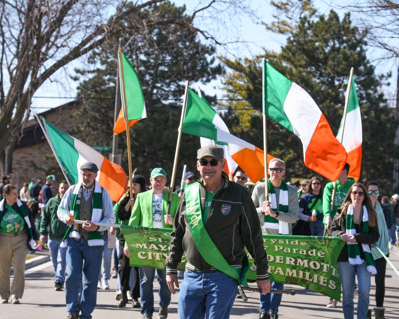 The Mayor of Countryside Sean McDermott along with other City Council members walk the Countryside St. Patrick’s Day parade route on Saturday March 2, 204.