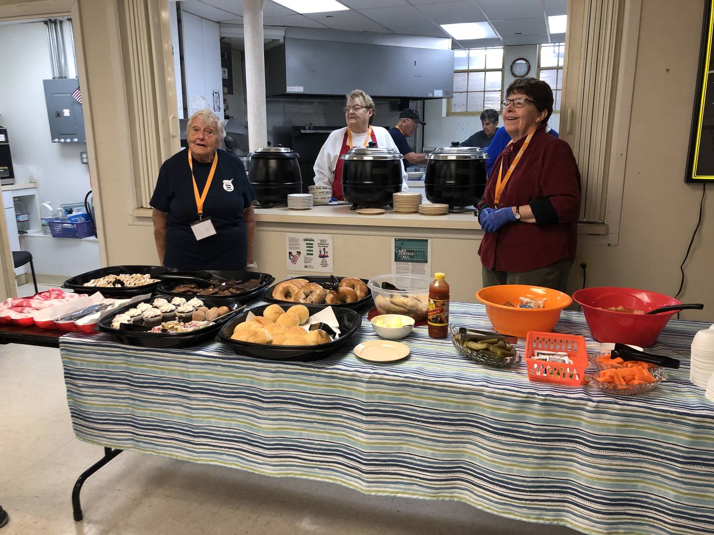 Darlene Finzel, left, Joane O'Rourke, and Barb  Komosa are among the volunteers each Tuesday at Stone Soup Social, held Tuesday, Oct. 18, 2022, at Marengo's United Methodist Church.