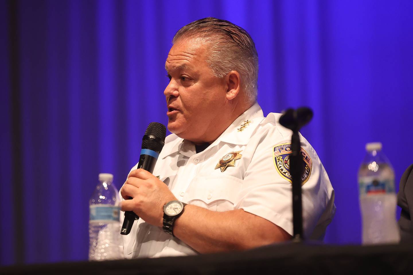 Joliet Police Chief Bill Evans answers a public question at the Public Safety Open Forum at the Billie Limacher Bicentennial Park Theatre on Wednesday June 26, 2024 in Joliet.