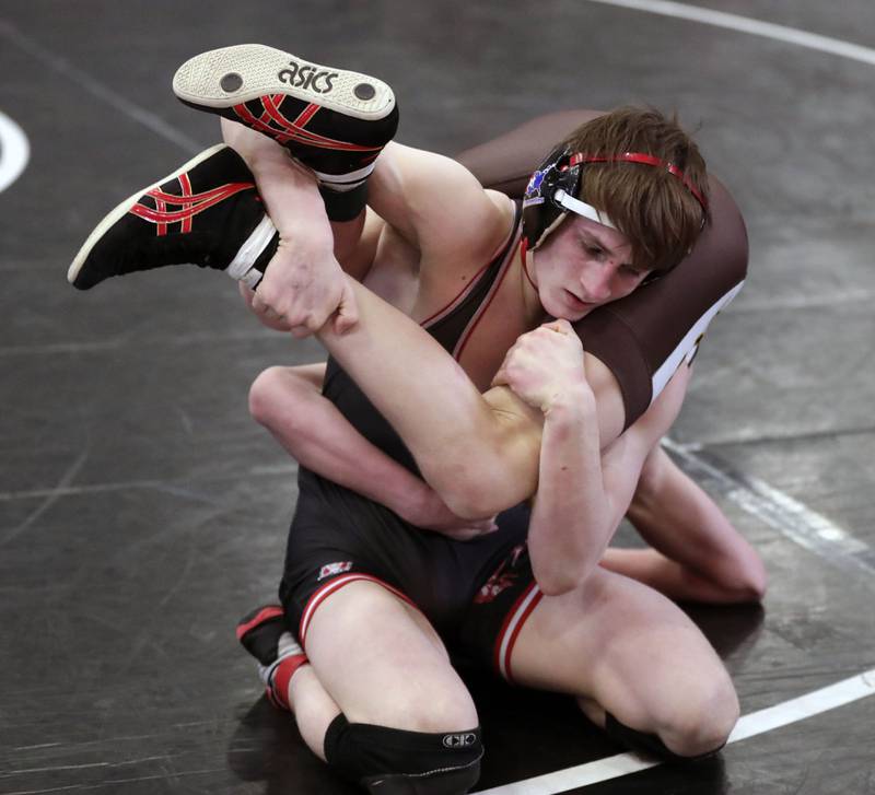 Barrington's Brian Beers wrestles Jacobs' James Wright at 126-pounds during the IHSA 3A Individual Sectional wrestling meet at Barrington High School Saturday February 12, 2022.