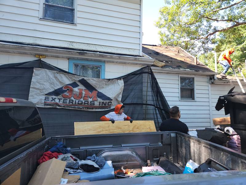 US Navy veteran Ernest Lopez of Joliet has received a new roof from 3JM Exteriors, Inc. as part of the Owens Corning Roof Development Project.