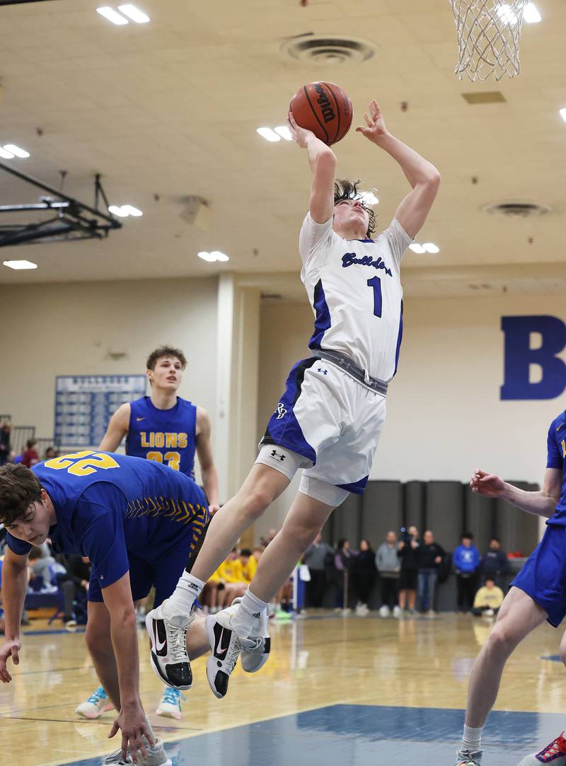 Riverside Brookfield’s Danny Loftus (1) goes in for the basket against Lyons during a boys varsity basketball game on Friday, Jan. 26, 2024 in Riverside, IL.