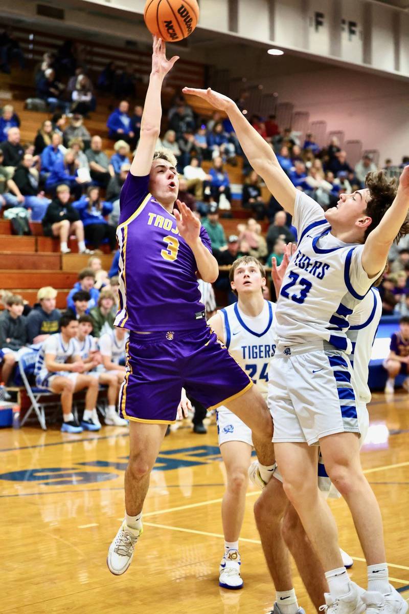 Mendota's Alex Beetz shoots over Princeton's Jackson Mason in the first half Friday night at Prouty Gym.